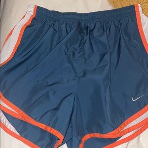 Navy, orange, white Nike shorts